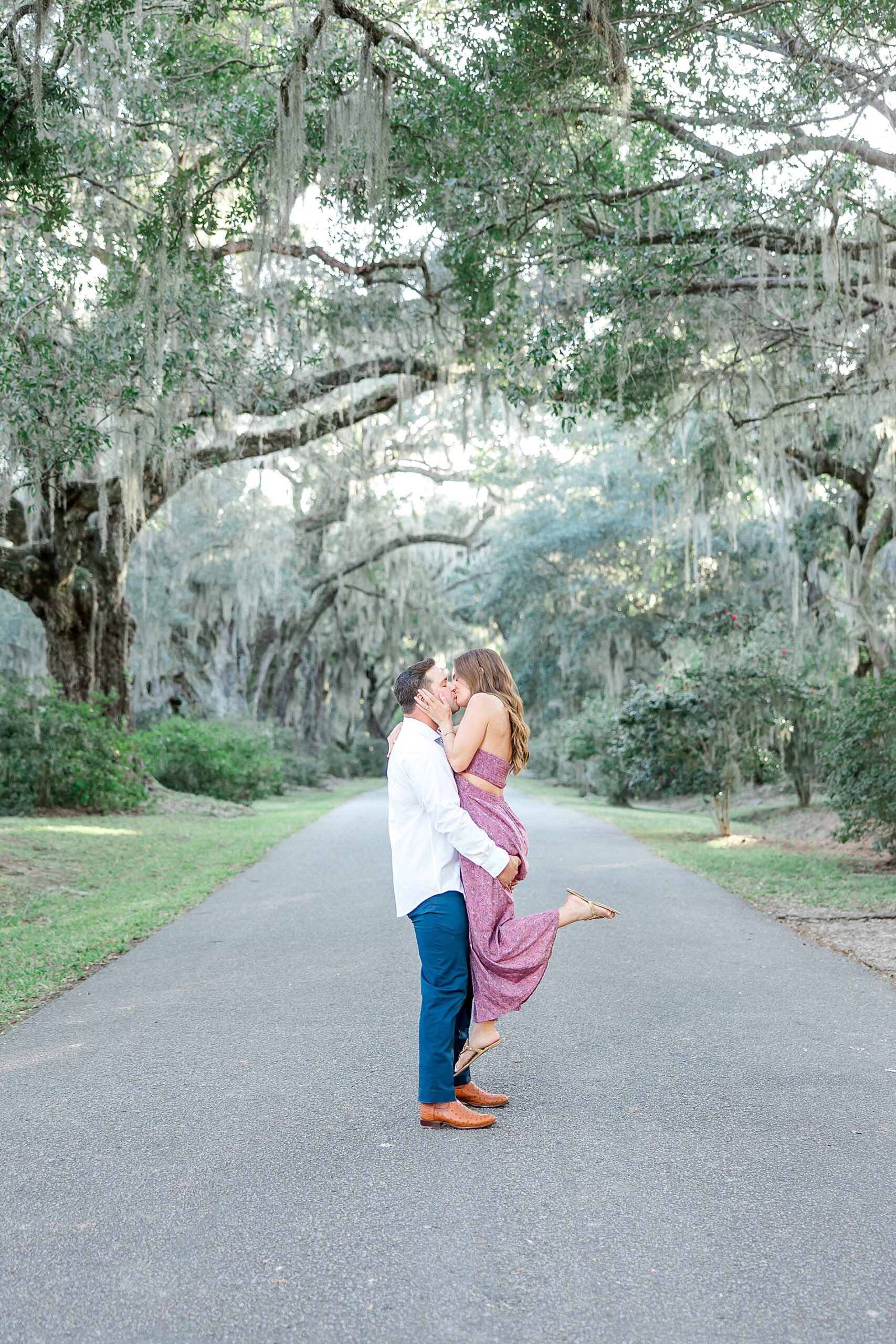 couple kiss during romantic engagement