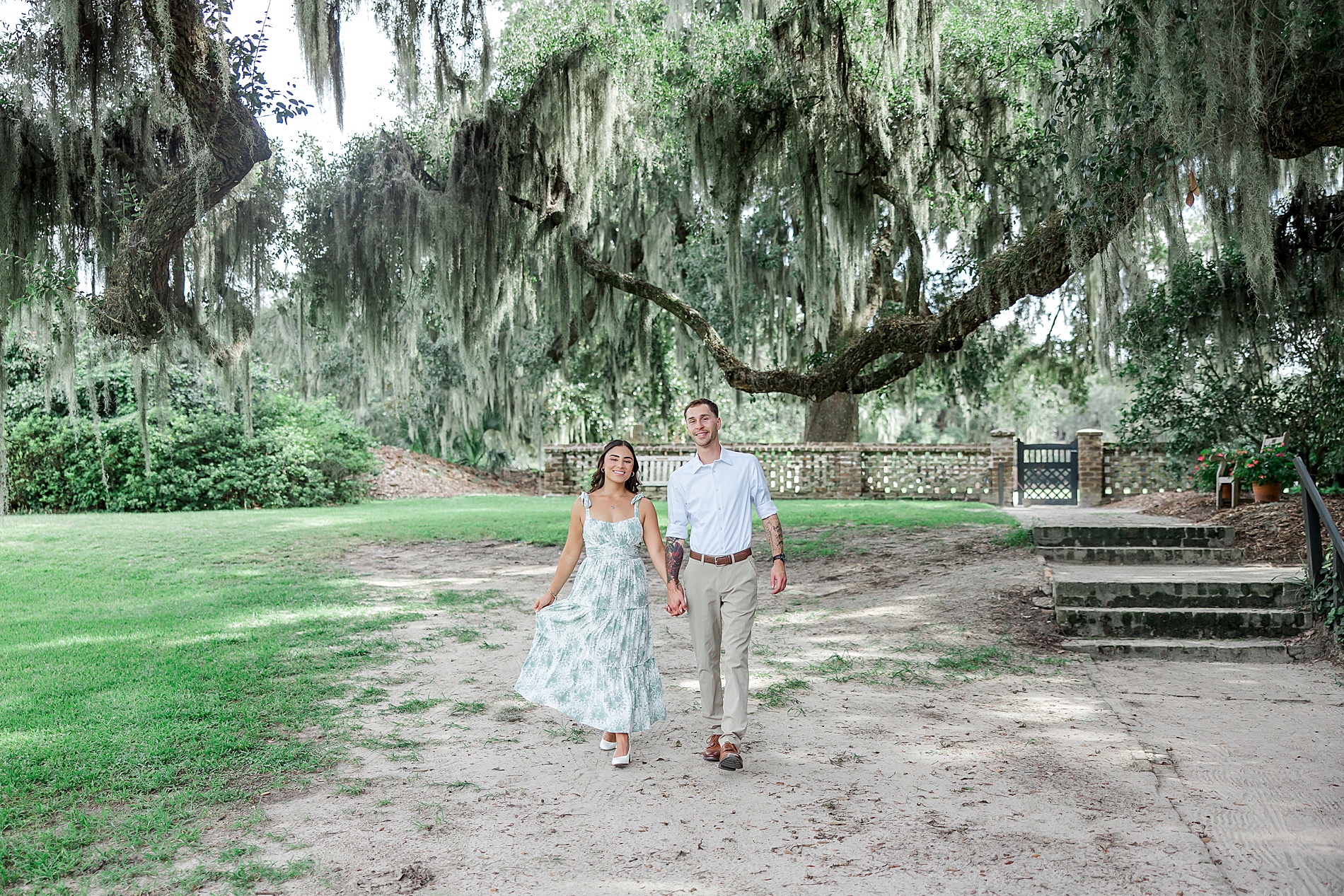 couple walking together at Middleton Place