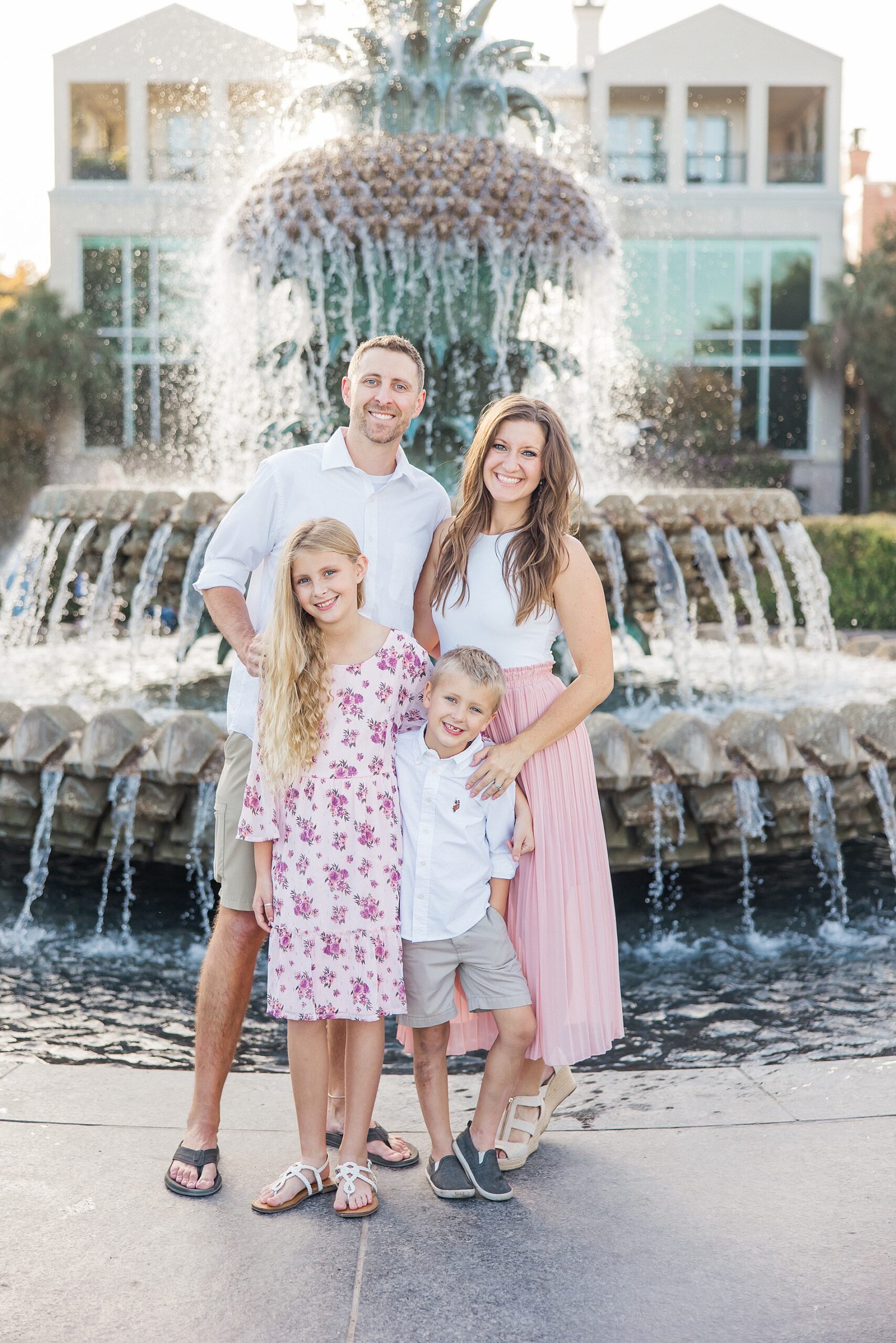 family photos at the iconic pineapple fountain in Charleston