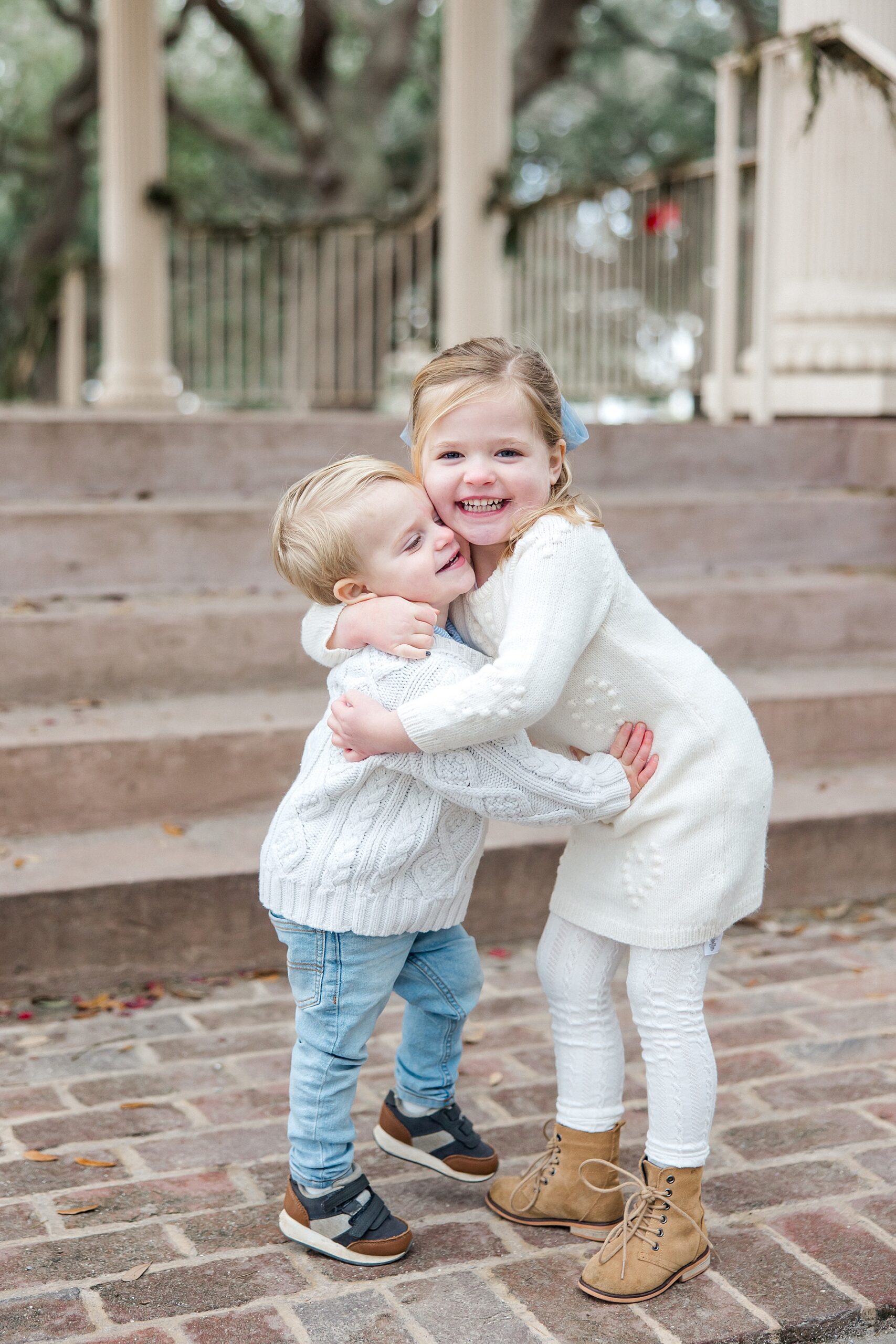 siblings hug each other